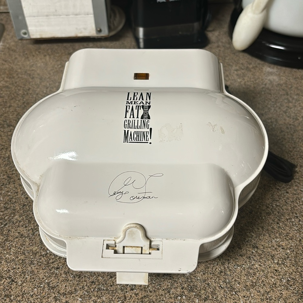 George Foreman Lean mean Fat Reducing Grilling Machine. Electric
